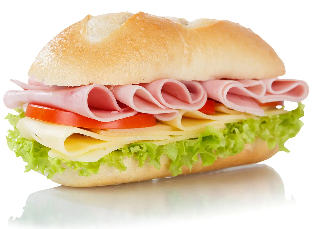 Sub sandwich with ham and cheese isolated on a white background