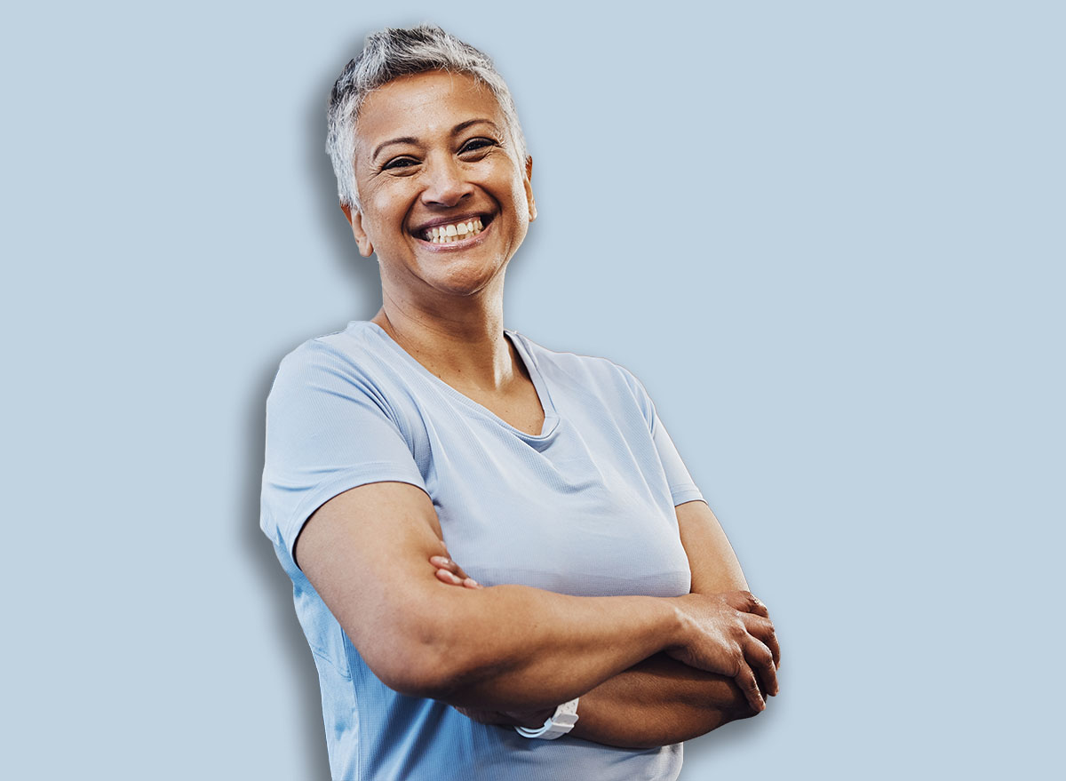 Senior, black woman and gym portrait of a person happy about fitness, training and exercise. Sports, happy and pilates studio of mature female with arms crossed proud about wellness and health